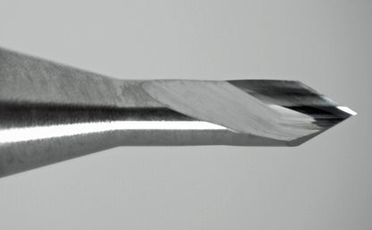close-up of 1/16 inch 60 degree spiral V-bit engraver tip showing dual flute cutting edges