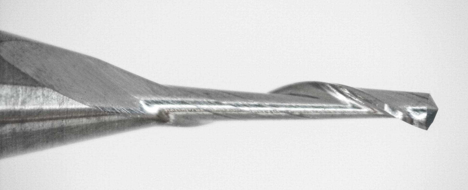 Close-up of pierce-point tip on Kyocera 1.00mm single-flute carbide end mill