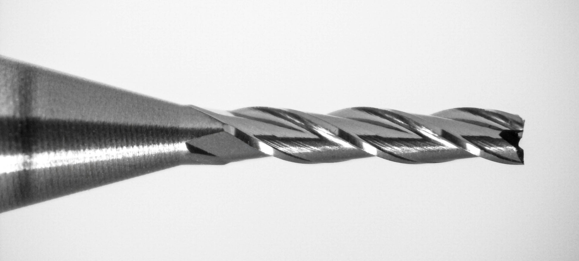 Close-up of Kyocera 0.0450 inch 3 flute square end mill tip with AlTiN coating