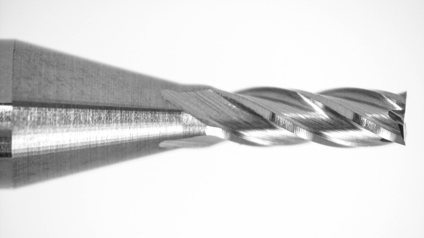 Close-up of cutting end on 1.30mm (.0510") 4-flute square end carbide end mill, bright uncoated