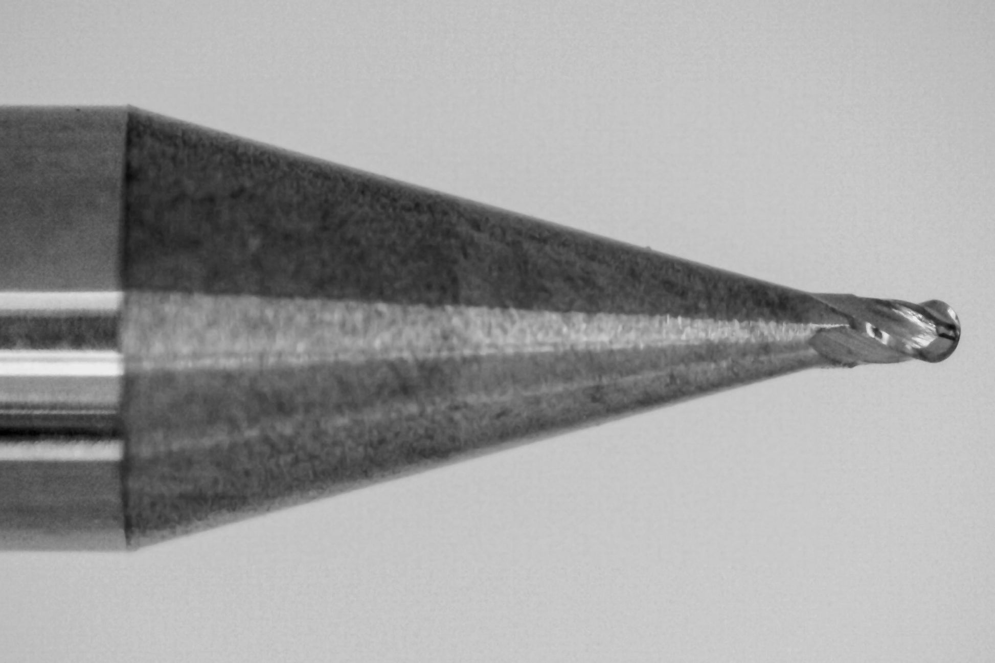 Close-up of ball nose tip on Kyocera 0.0190 inch 4-flute stub length solid carbide end mill