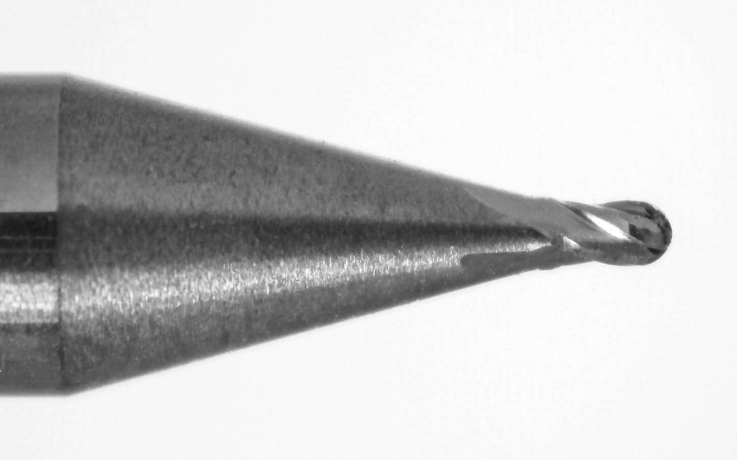 Close-up of Kyocera 0.026 inch ball nose end mill tip with AlTiN coating