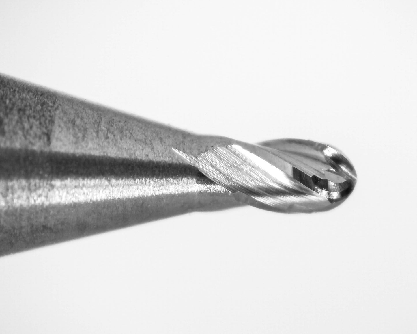 cutting tip close up of 0.050 inch 4 flute carbide ball nose end mill Kyocera 1835-0500.075