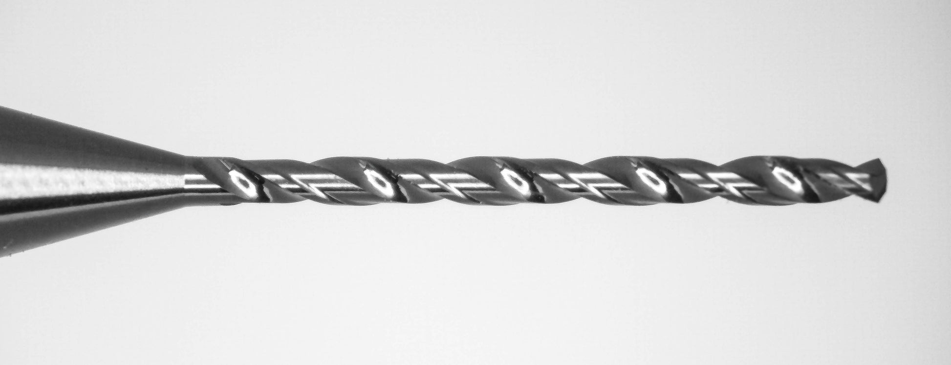 Close-up of Kyocera 0.80mm DLC coated micro drill tip