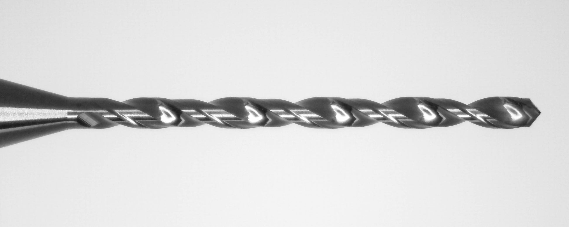Close-up of Kyocera 0.90mm DLC coated micro drill tip