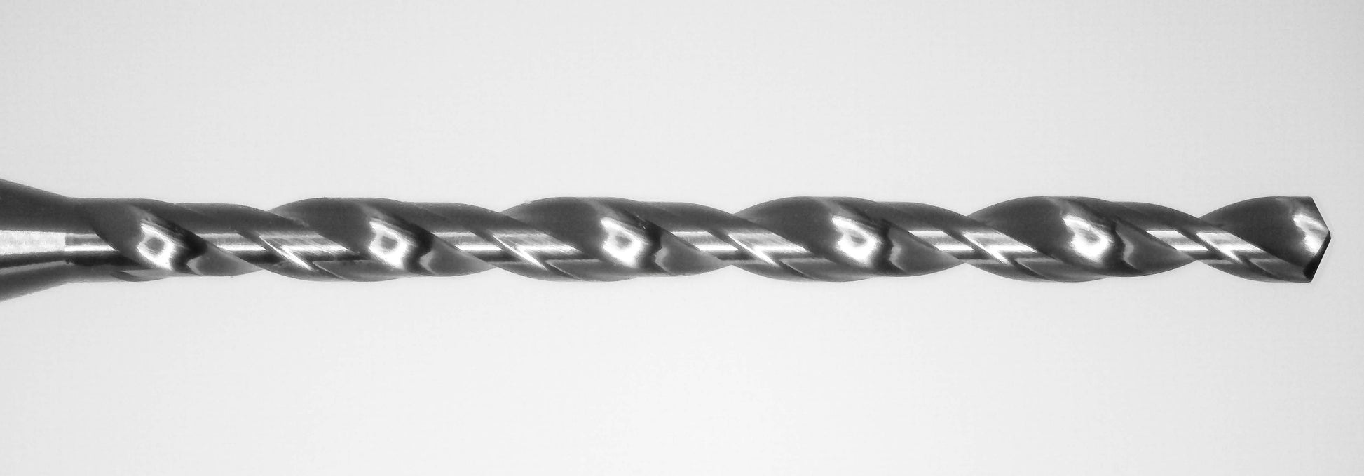 Close-up of Kyocera 1.30mm DLC coated micro drill tip