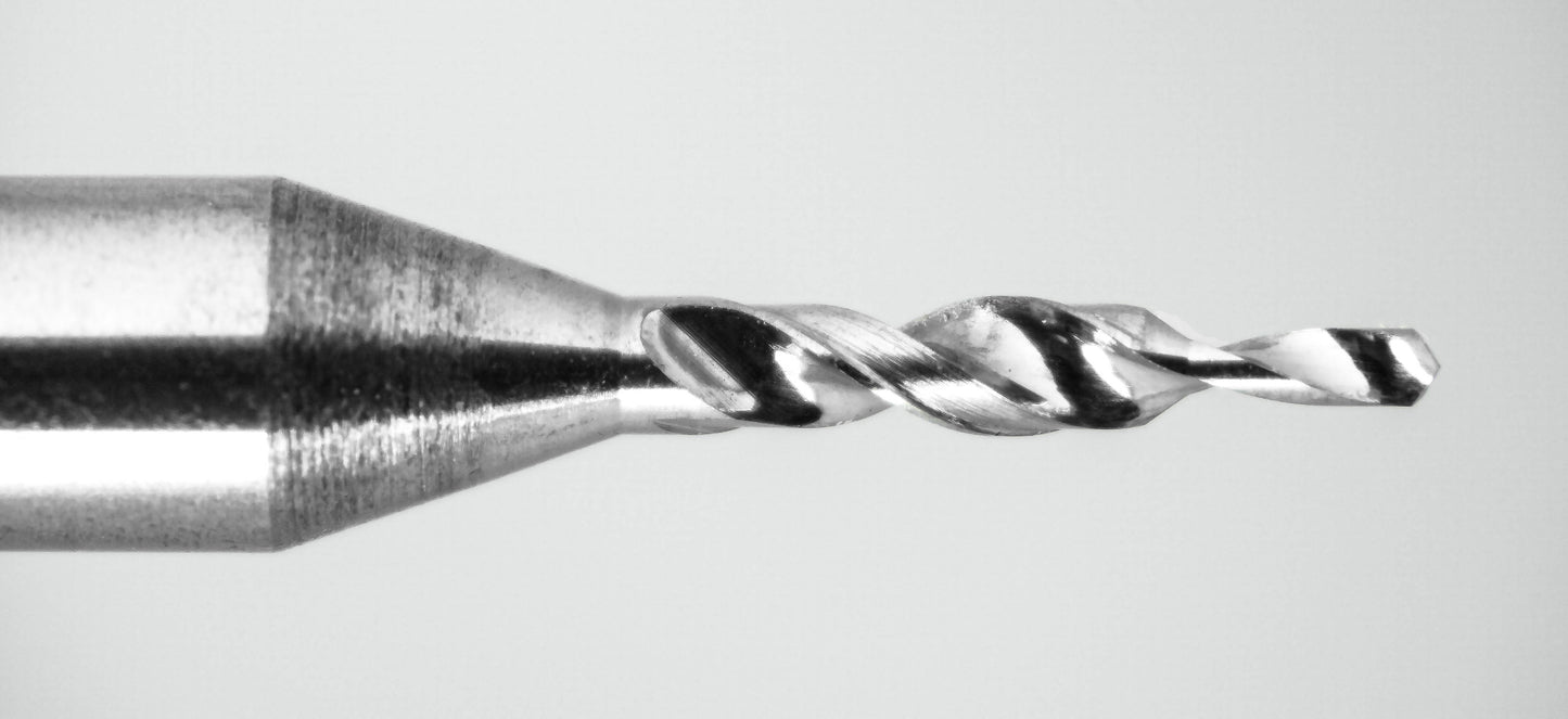 close up of carbide step drill showing step transition between diameters
