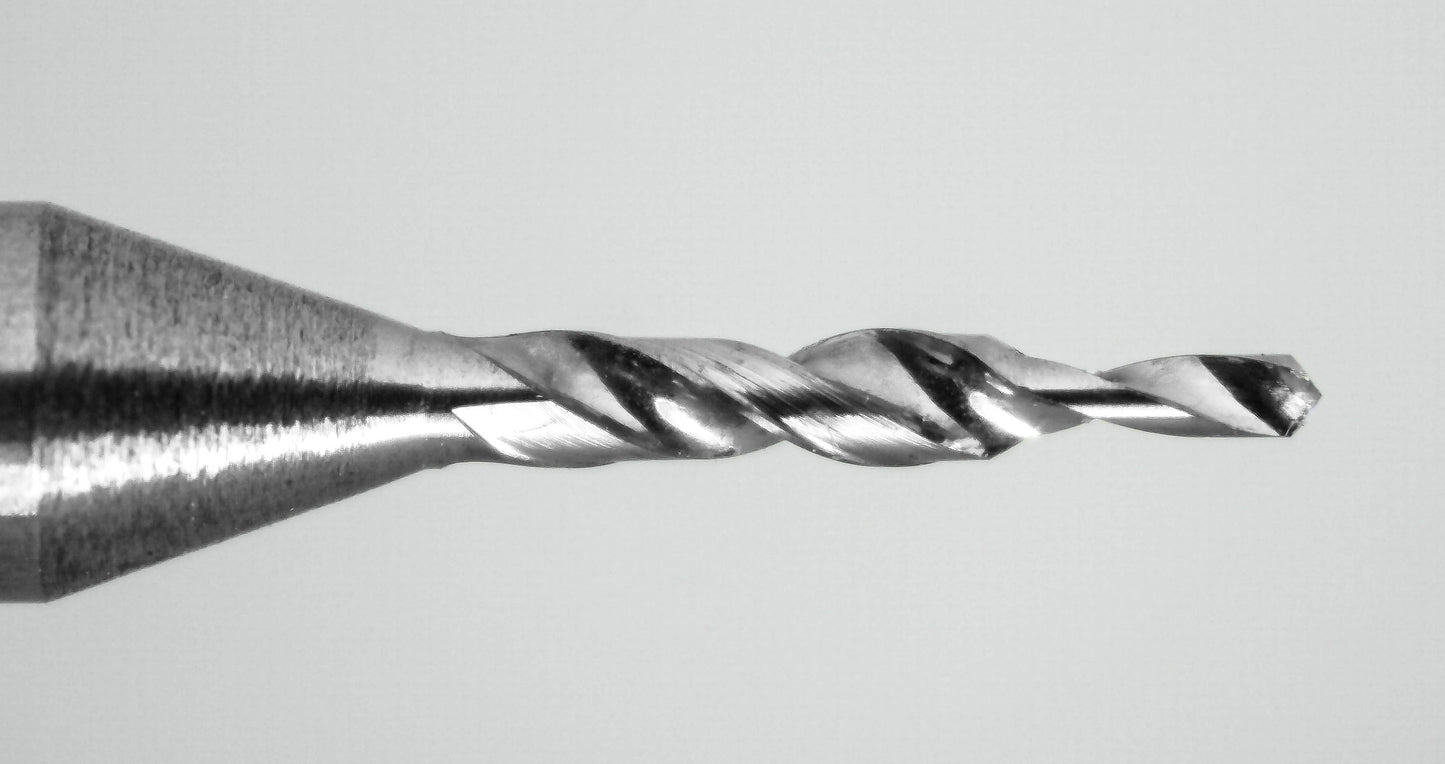 carbide step drill cutting edge close-up .026 pilot .043 step