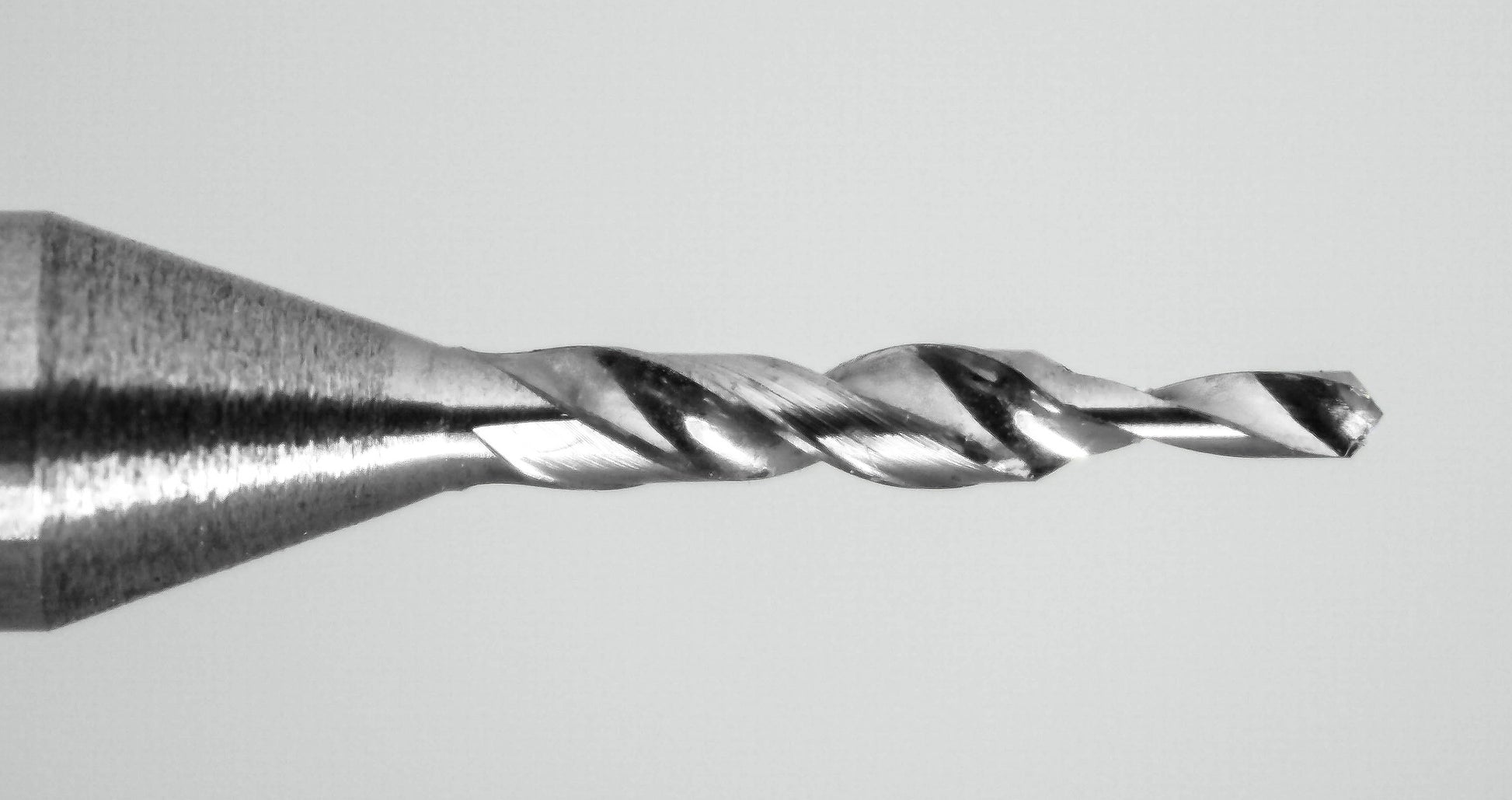 carbide step drill cutting edge close-up .026 pilot .043 step