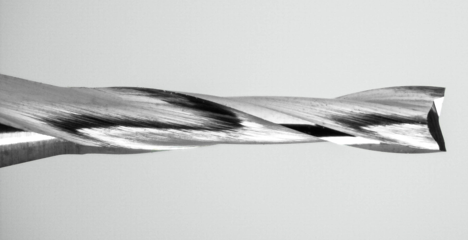 2 flute carbide end mill cutting edge close-up fish tail tip