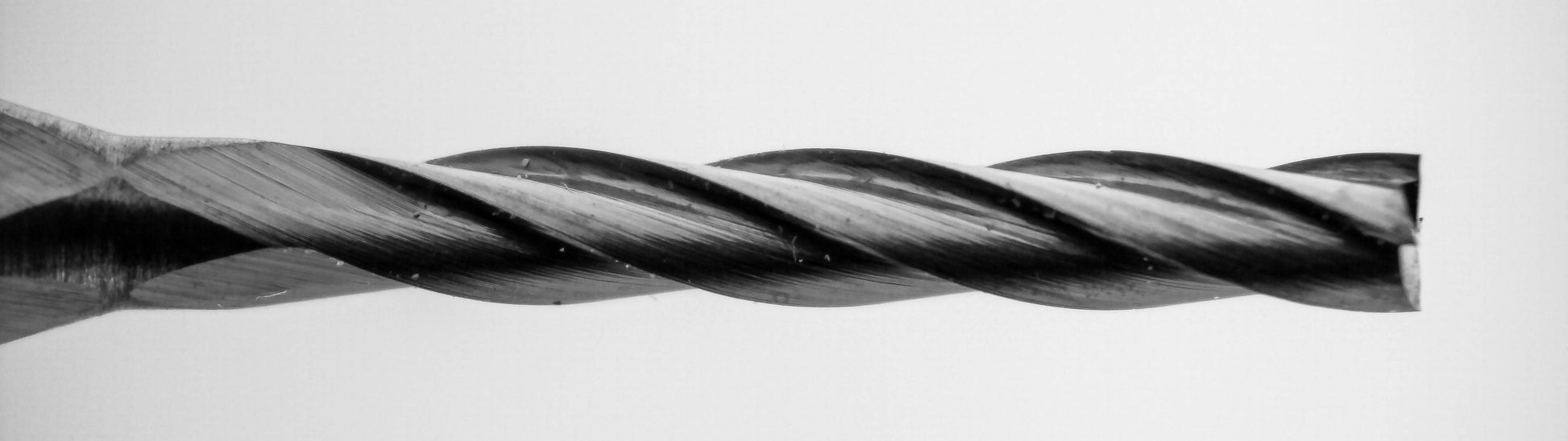 Close-up of square end tip on 0.0500 inch 4 flute up cut carbide end mill