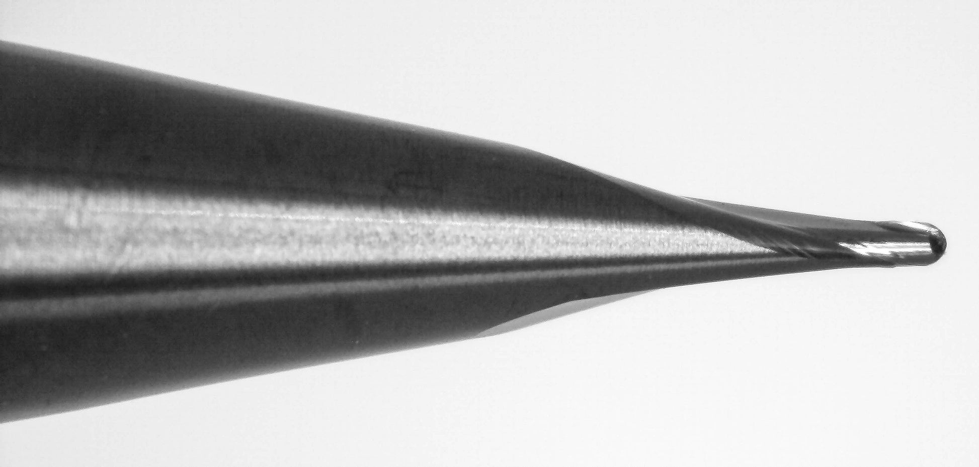 Close-up of cutting end on Kyocera 0.60mm 2-flute KTX-I coated ball nose carbide end mill
