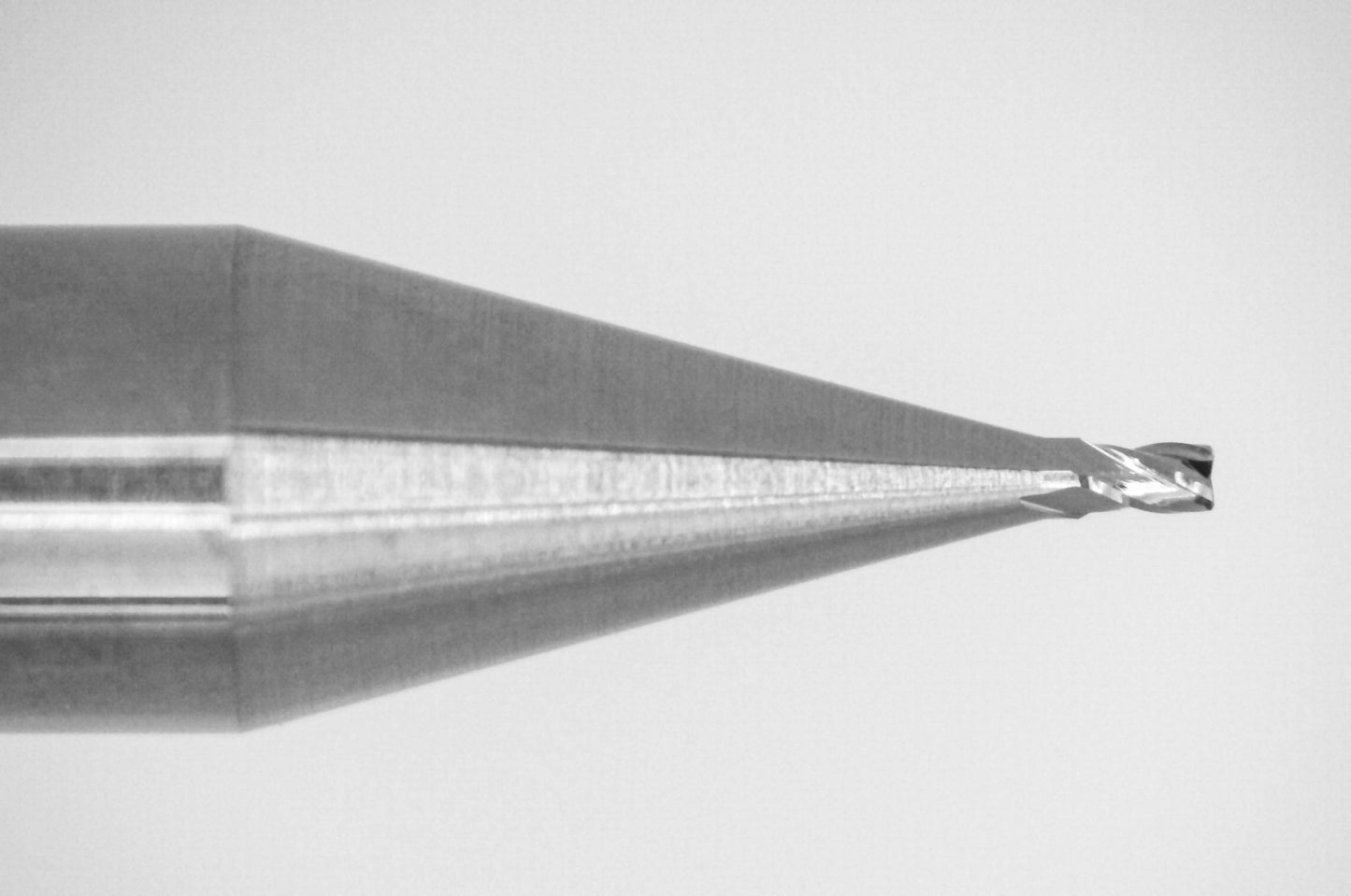 Close-up of cutting end on Kyocera .0180 inch 4-flute uncoated stub-length square end carbide end mill