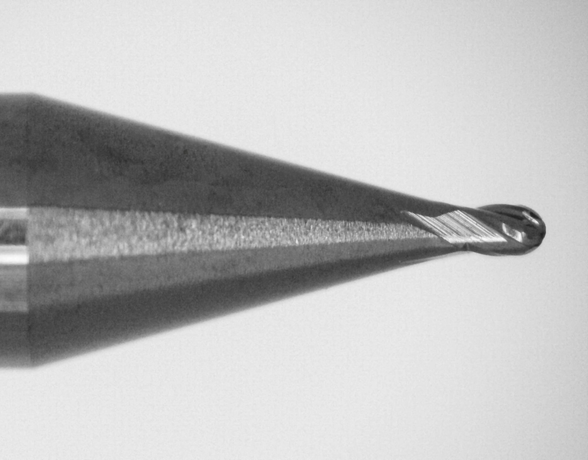 Close-up of cutting end on Kyocera .0240 inch 4-flute AlTiN-coated stub length ball nose carbide end mill