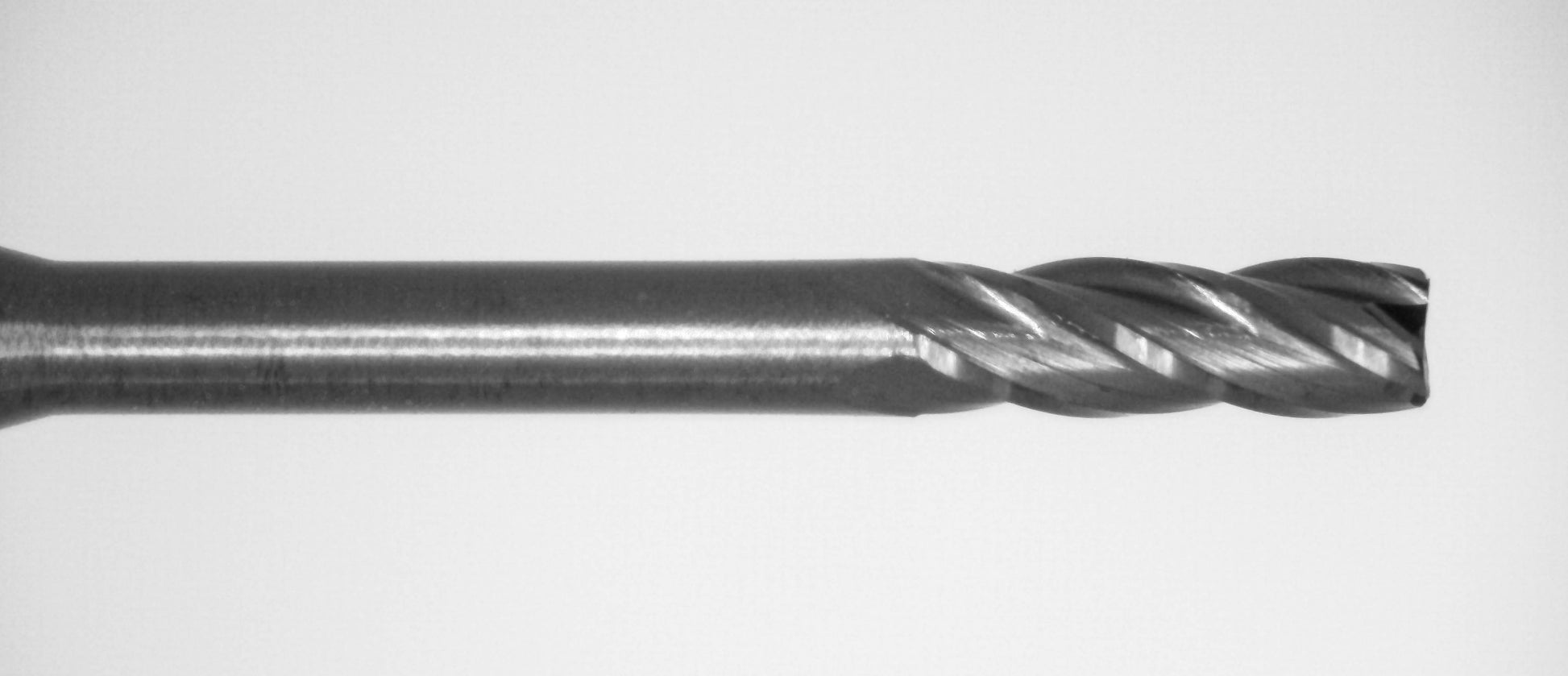 Close-up of cutting end on Kyocera .0600 inch 4-flute AlTiN coated extended reach square end carbide end mill