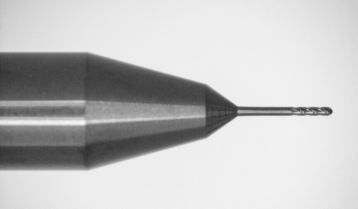 Close-up of cutting end on Kyocera .0100 inch 4-flute AlTiN coated extended reach ball nose carbide end mill