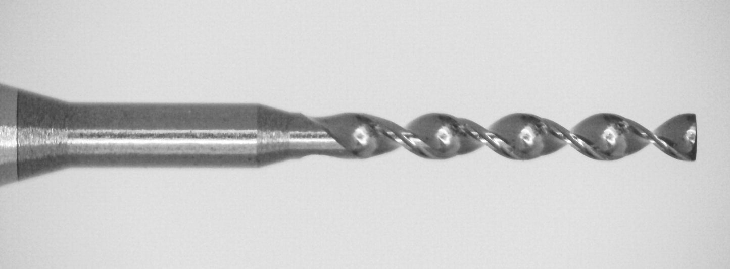Close-up of tip on Kyocera 0.60mm flex material solid carbide drill with 170 degree point