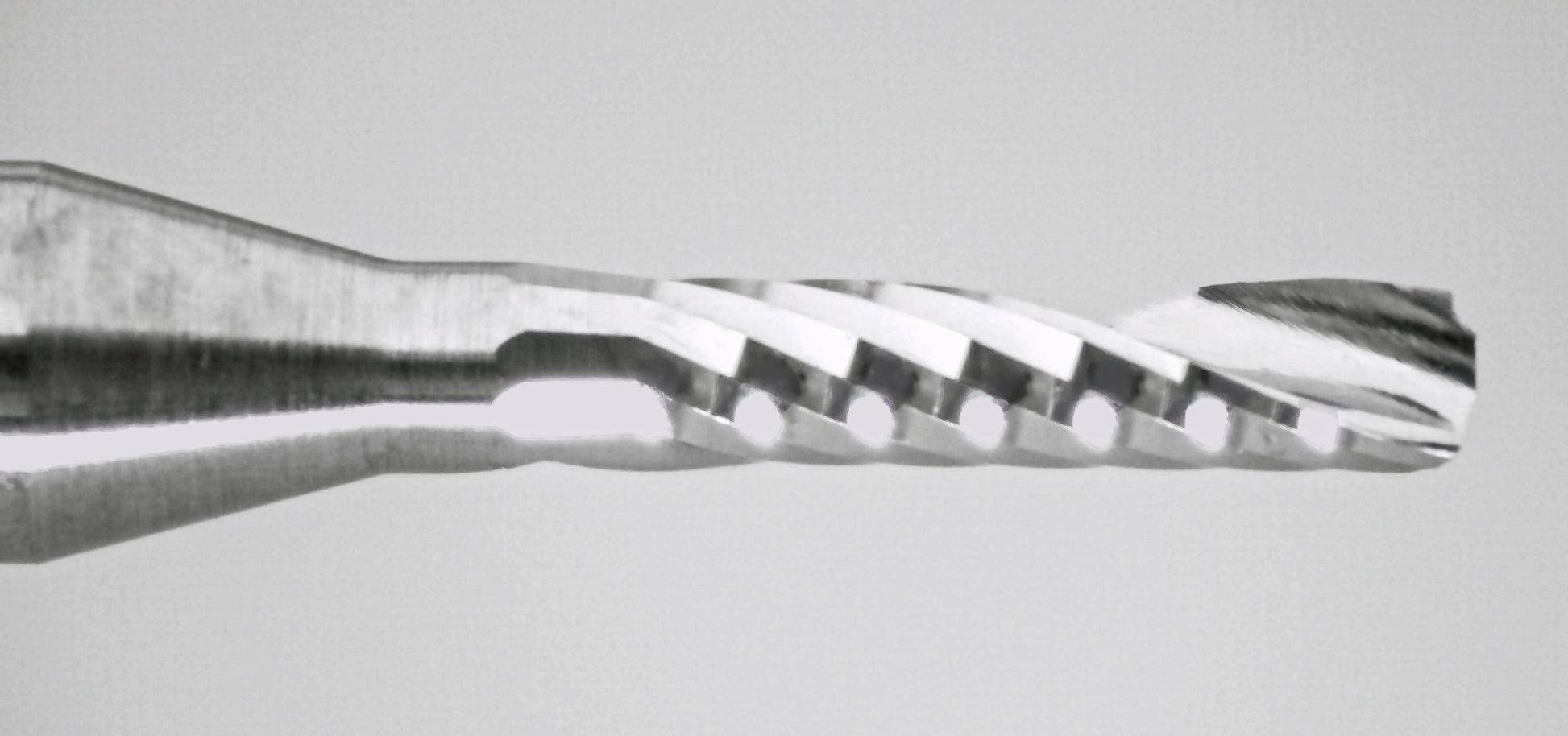 Close-up of cutting end on lightly used 1/16 inch single O-flute carbide end mill