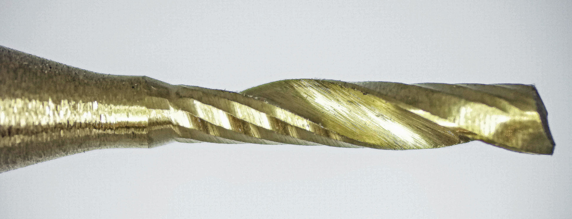 Close-up of cutting tip on .0472 inch 1.20mm titanium coated single O-flute carbide end mill