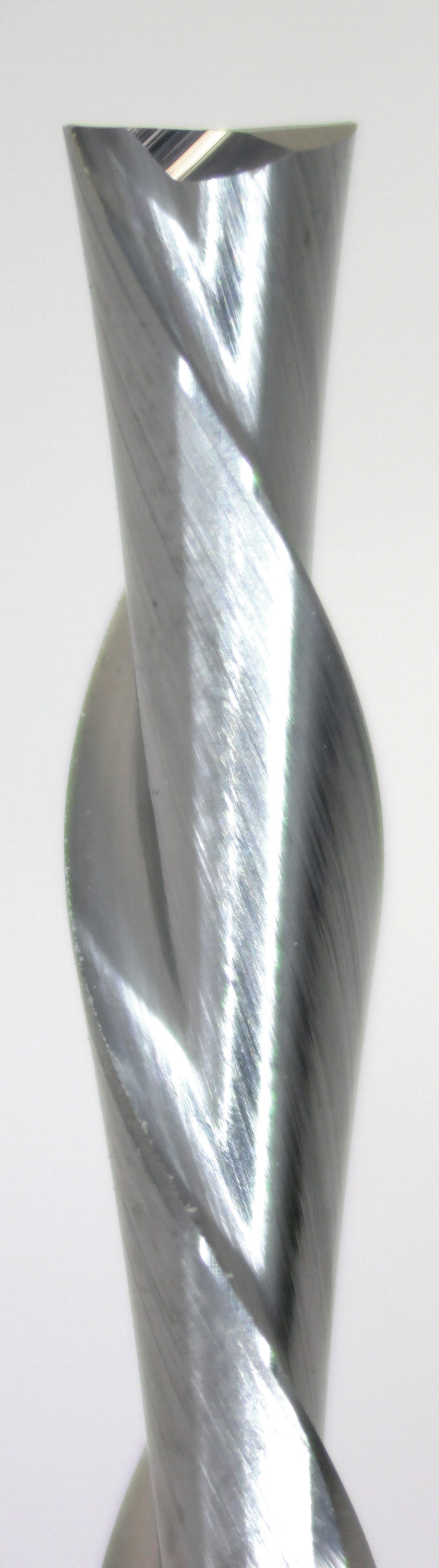 Close-up of 1/8 inch down-cut spiral end mill showing carbide flutes