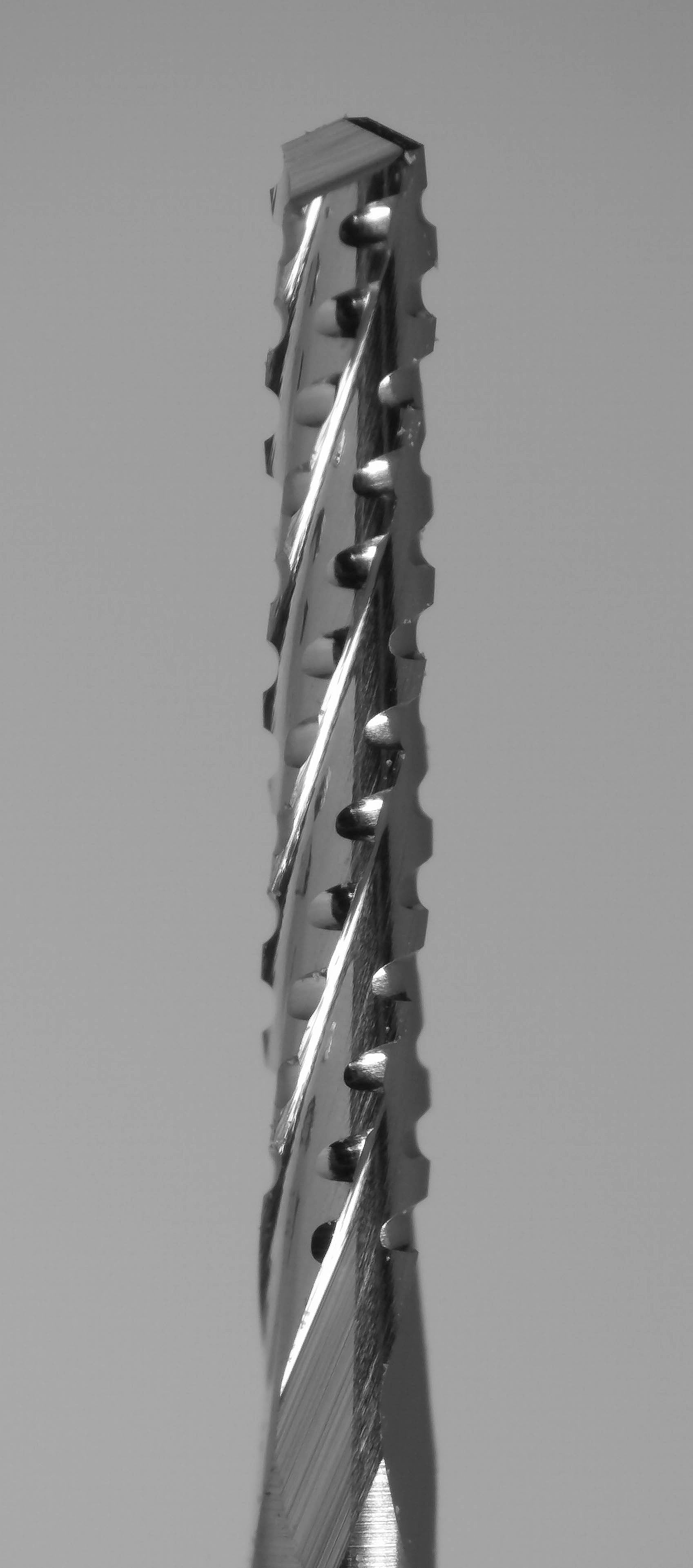 Drill point tip on 1/32 inch chip breaker carbide router