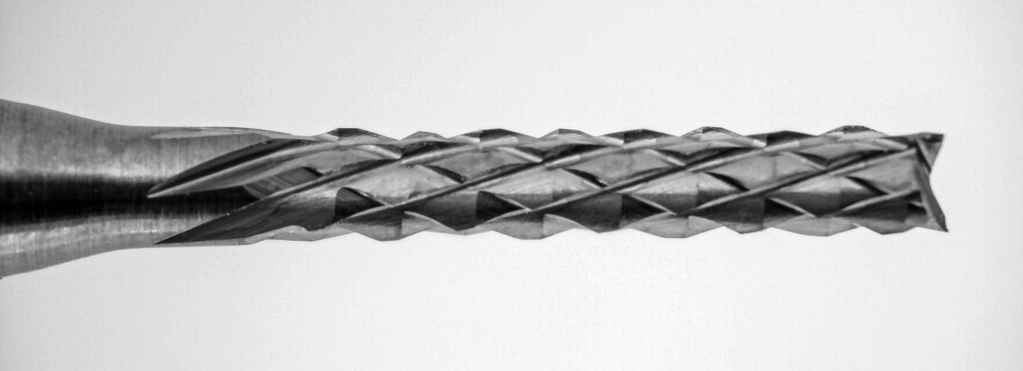 Close-up of fish tail tip and down cut diamond pattern flutes on 1/16 carbide router bit